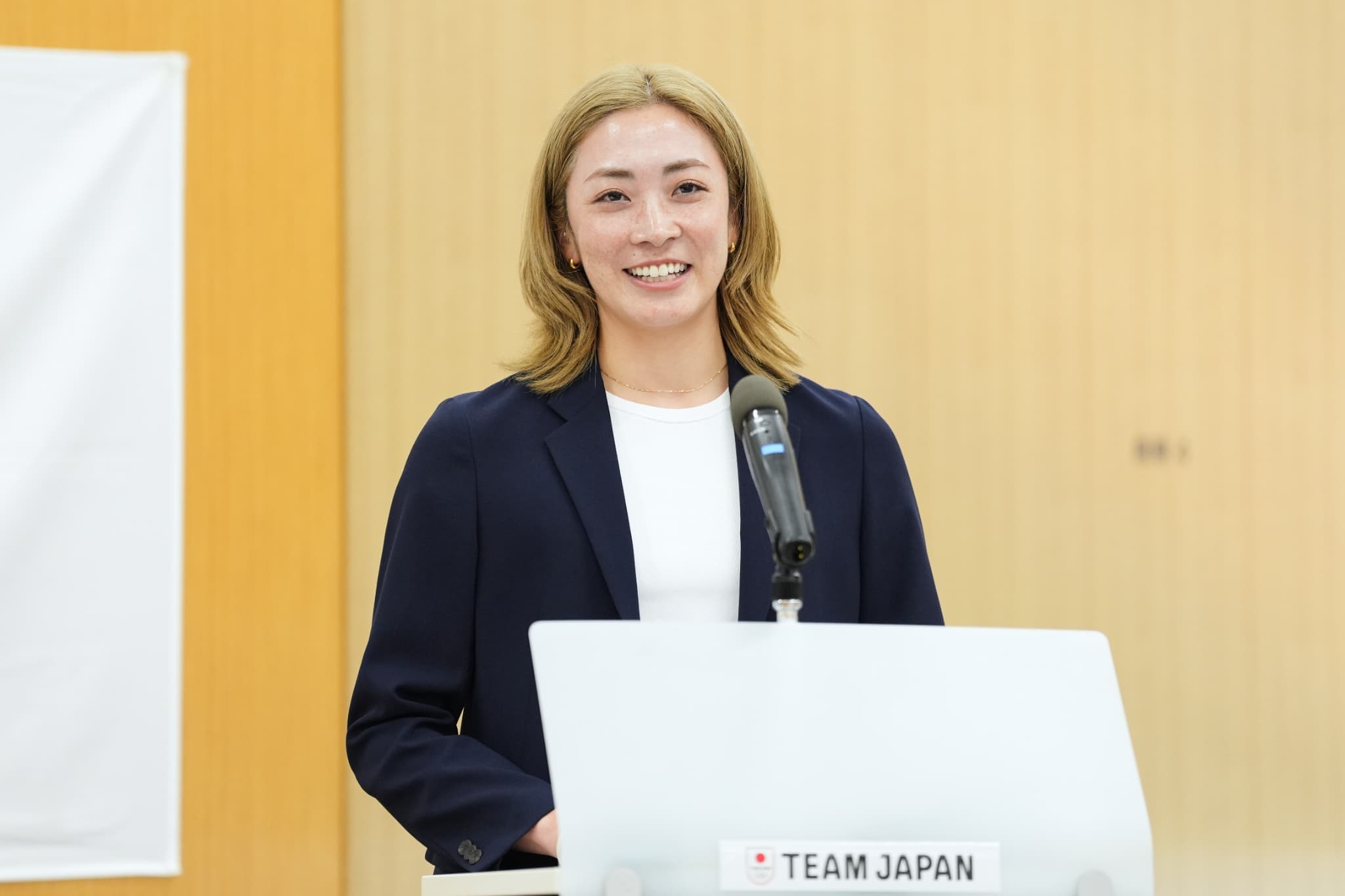 採用企業事例講演をする城北信用金庫Johoku Athletes Clubアスリートマネージャーの久良知美帆氏（写真：アフロスポーツ）