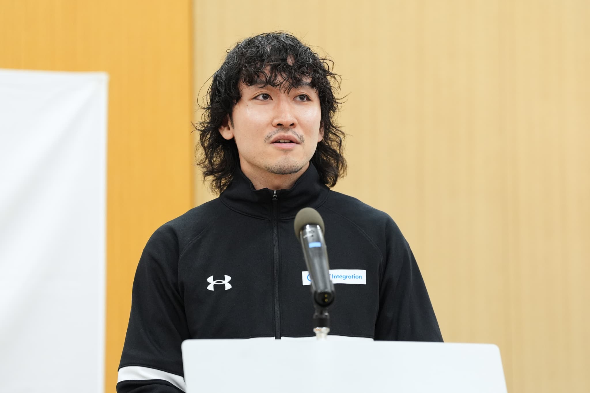 アスリート体験談に登壇したNTTインテグレーション株式会社の川村京太選手（写真：アフロスポーツ）
